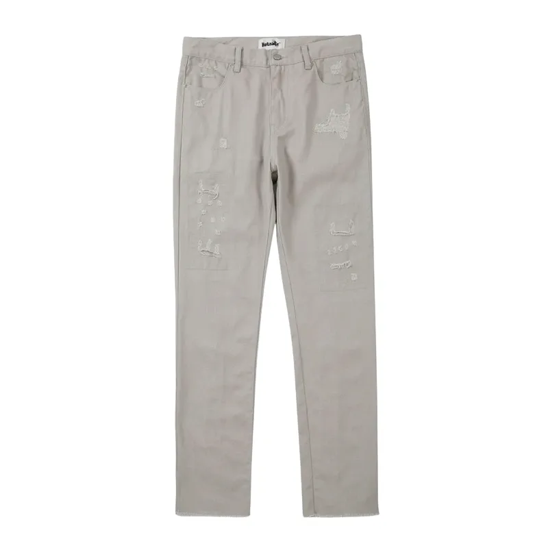 Slim fit distressed jean with back leg zipper